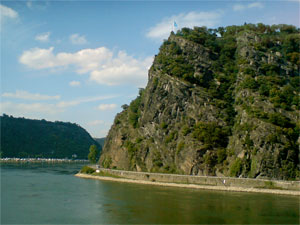 "... The air is cool and nightfall, The calm Rhine courses its way; The peak of the mountain is sparkling ..." Heinrich Heine, "The Loreley"